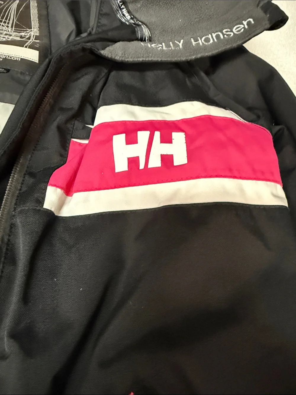 Helly Hansen Black Ski Jacket with Pink and White Accents